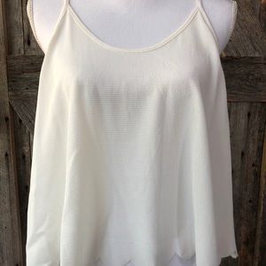 White scalloped top